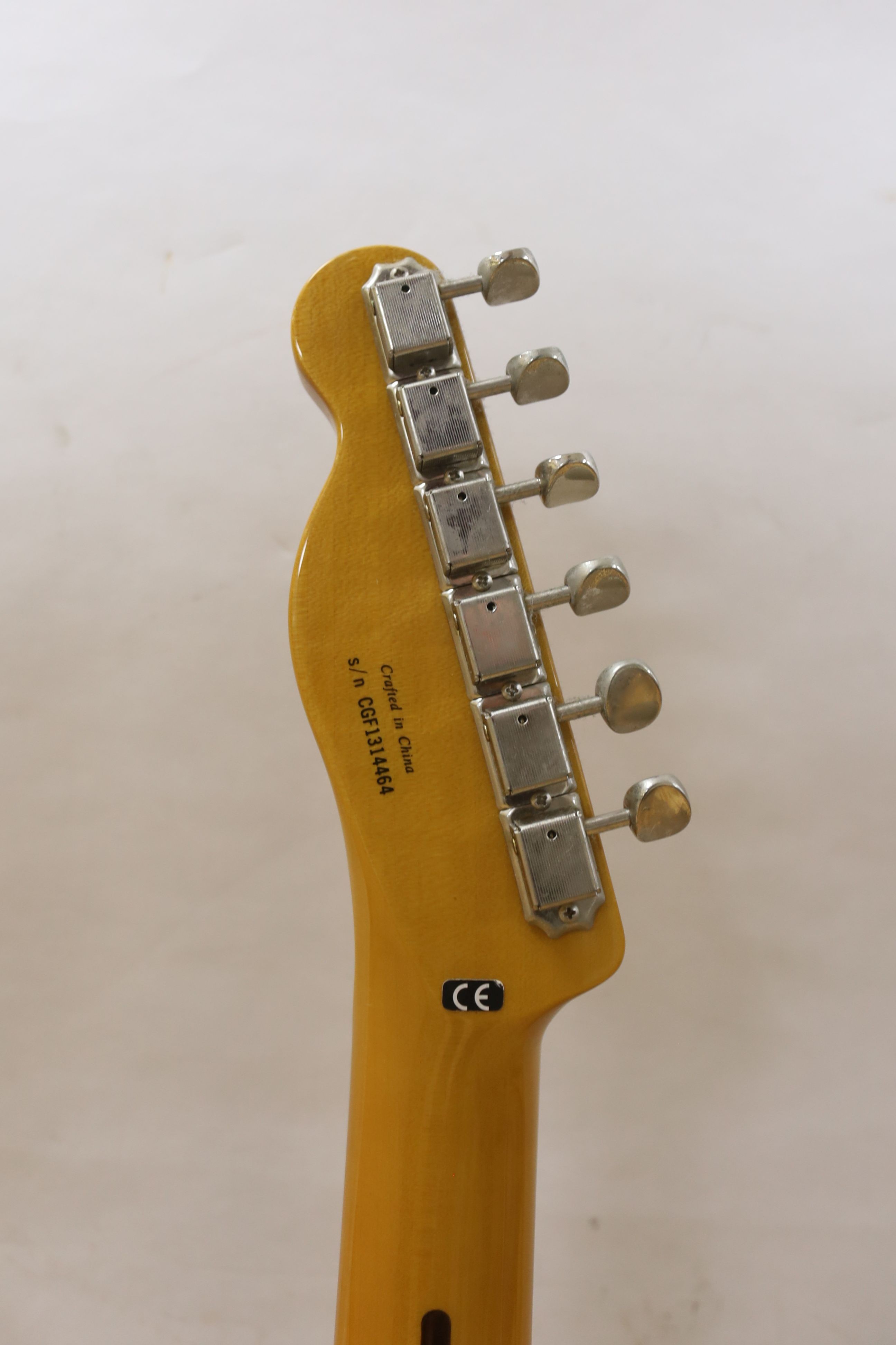A Fender Telecaster guitar. Serial number CGF1314464